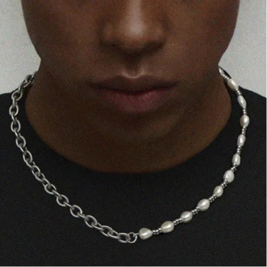 Baroque Pearl and Spiral Chain Half-and-Half Necklace — front neckline-worn view over a dark shirt