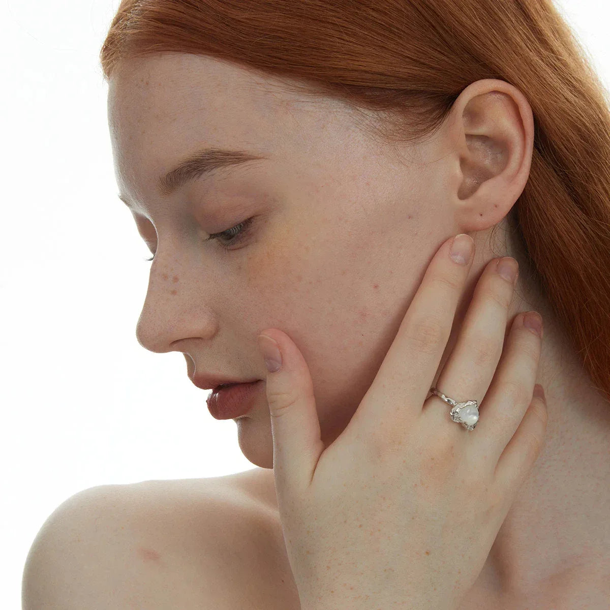 Open Pearl Heart Ring — alternate portrait showing the ring on the hand