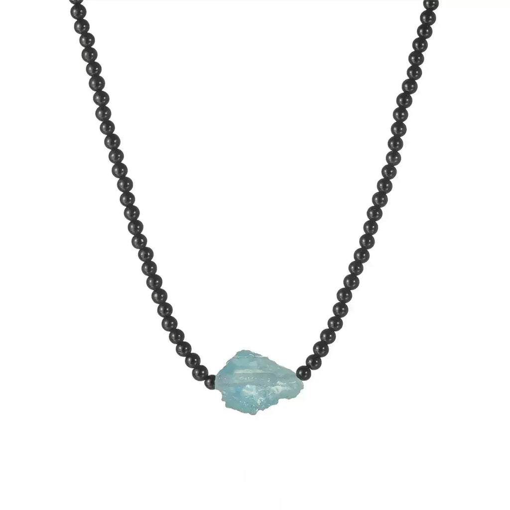 Black Agate and Raw Aquamarine Beaded Necklace styled neckline view showing pendant scale