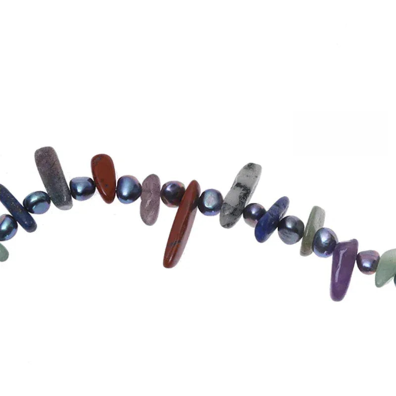 Black Pearl and Colorful Jade Chip Necklace — macro view of the alternating dark pearls and colorful elongated chips