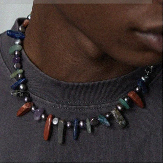 Black Pearl and Colorful Jade Chip Necklace — front neckline-worn close-up over a dark shirt