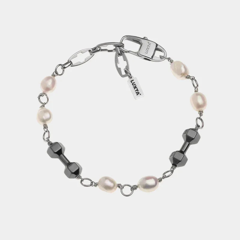 Black Pearl and Obsidian Beaded Bracelet — front view of bracelet with pale pearls and faceted dark beads