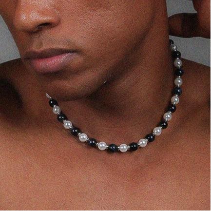Black Tiger Eye and Pearl Beaded Necklace — alternate front chest-worn view showing the bead scale
