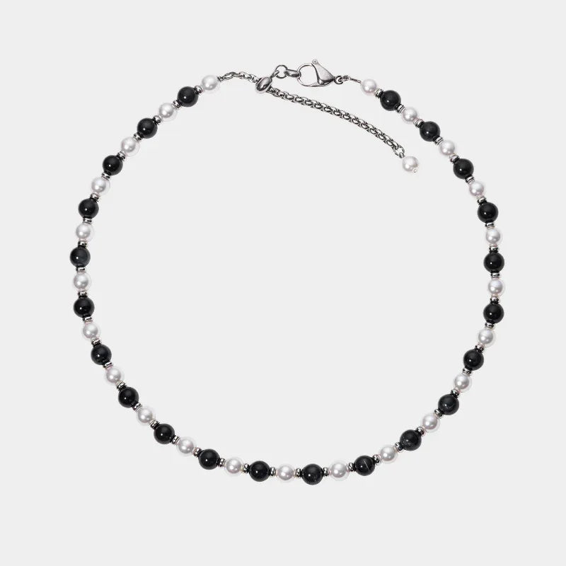 Black Tiger Eye and Pearl Beaded Necklace — front view of alternating black and pale beaded necklace
