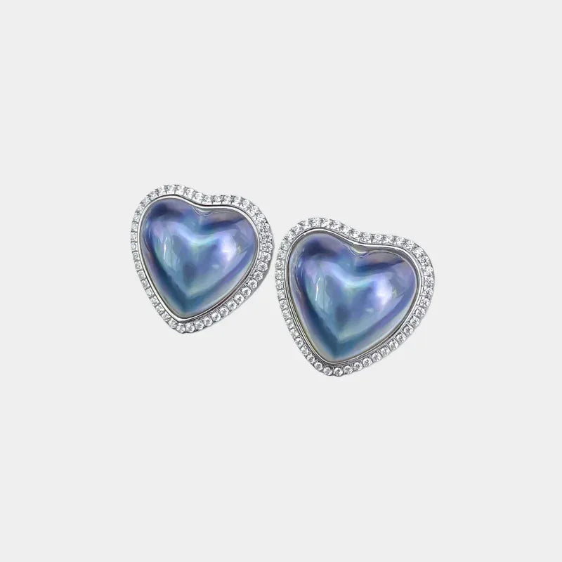 Blue Iridescent Pearl Heart Halo Stud Earrings — front pair of blue iridescent heart studs with clear halos