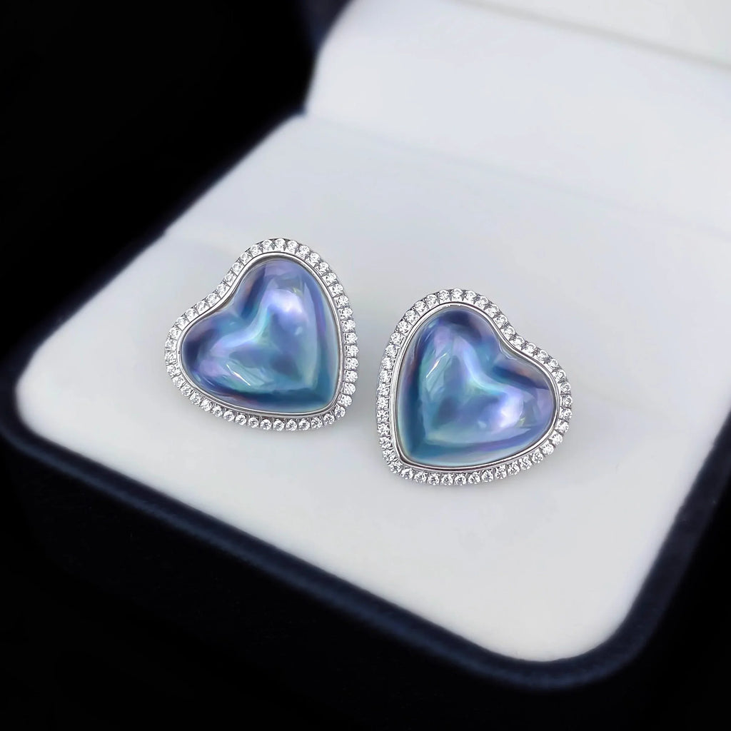 Blue Iridescent Pearl Heart Halo Stud Earrings — pair displayed in a black jewelry box