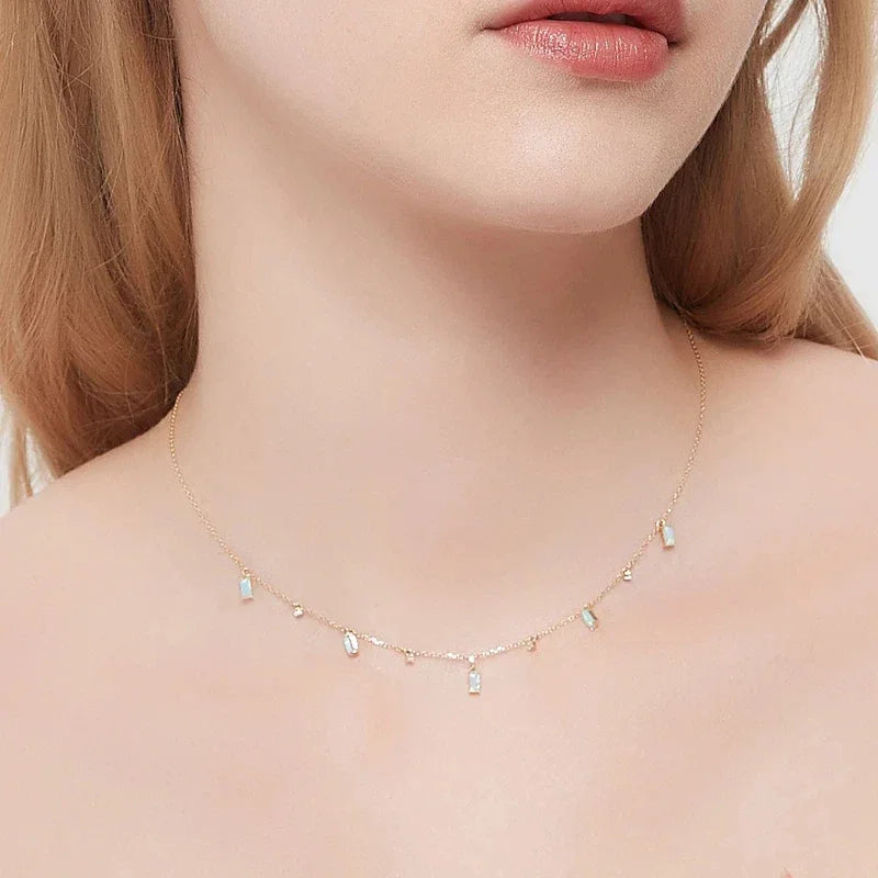Blue Opal Geometric Station Necklace worn at the neckline