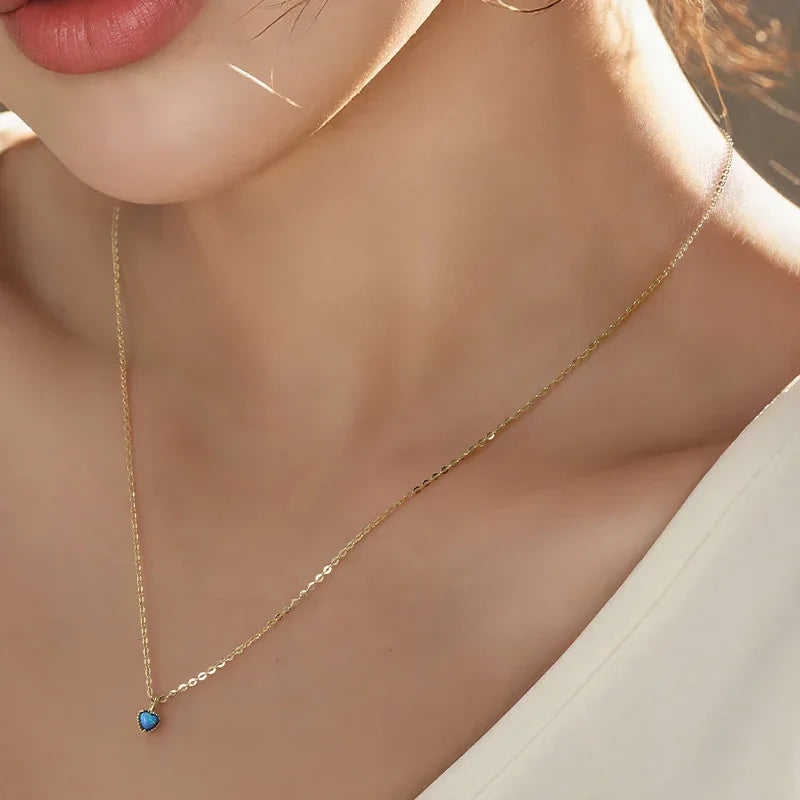 Blue Opal Heart Pendant Necklace worn at the neckline from another angle
