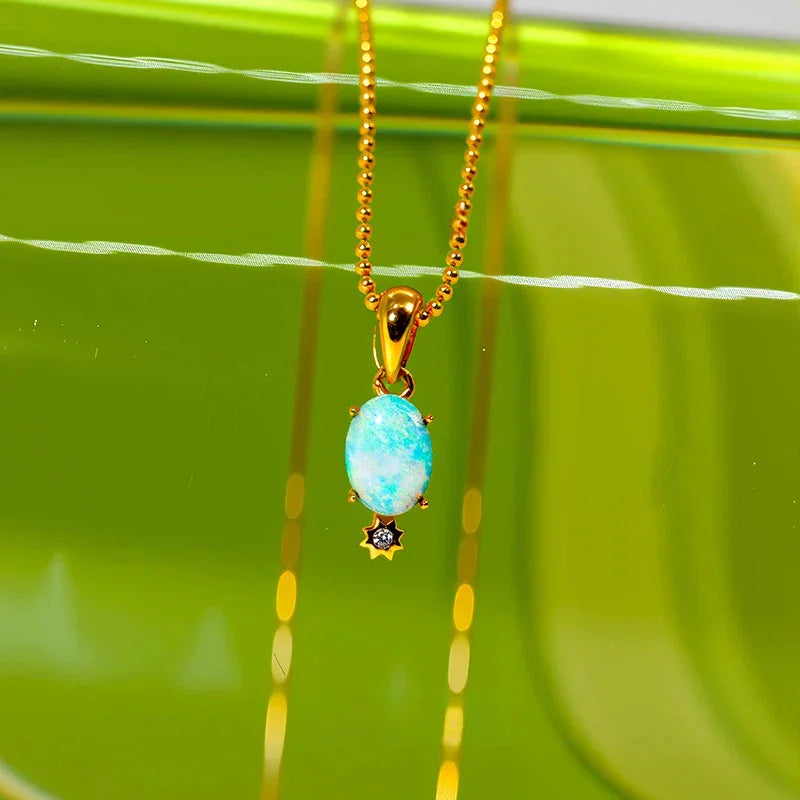 Blue Opal Petite Pendant Necklace worn at the neckline