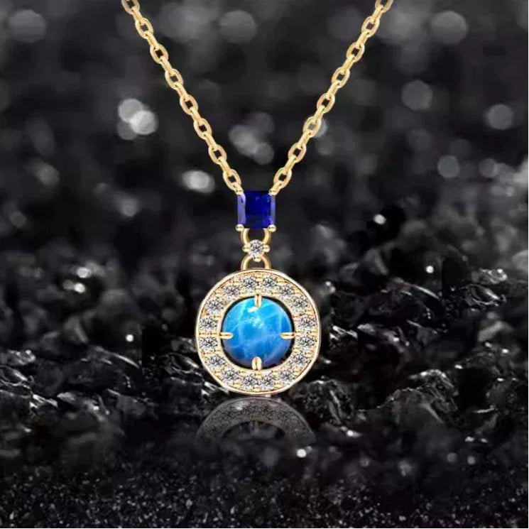 Blue Opal Round Halo Pendant Necklace worn at the neckline