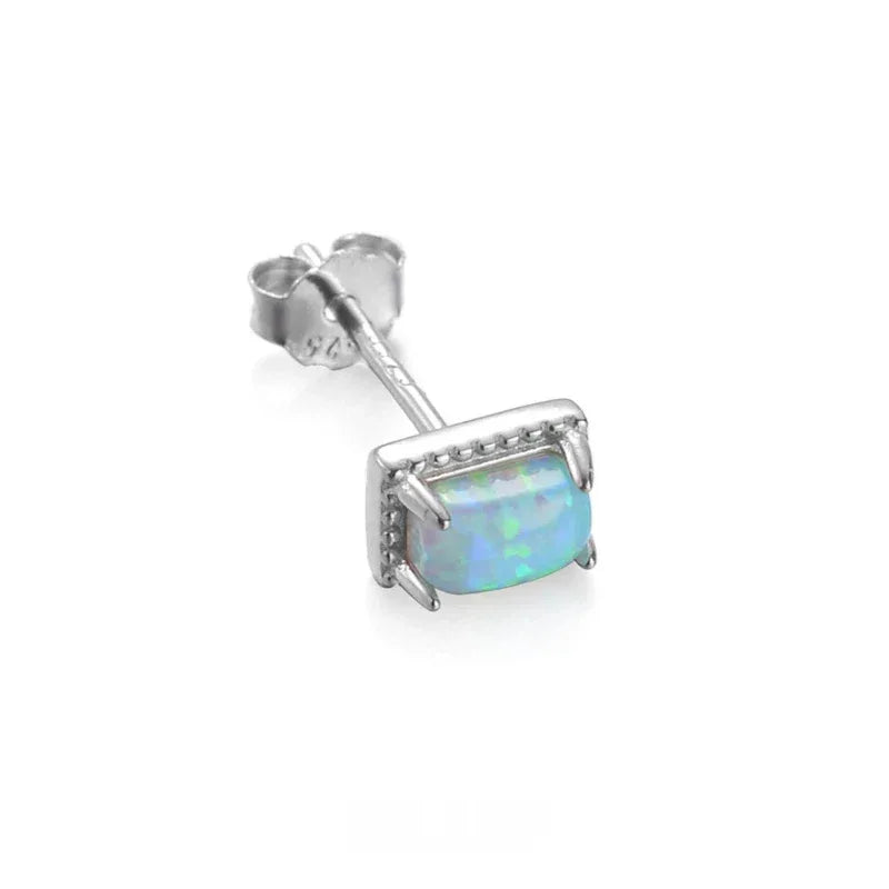 Blue Opal Square Stud Earrings worn on the hand