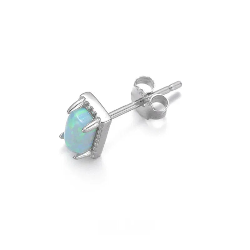 Blue Opal Square Stud Earrings worn on the hand from another angle