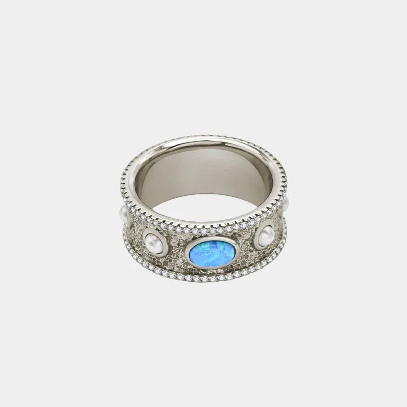 Blue Opal Wide-Band Oval Ring front product view on a light background