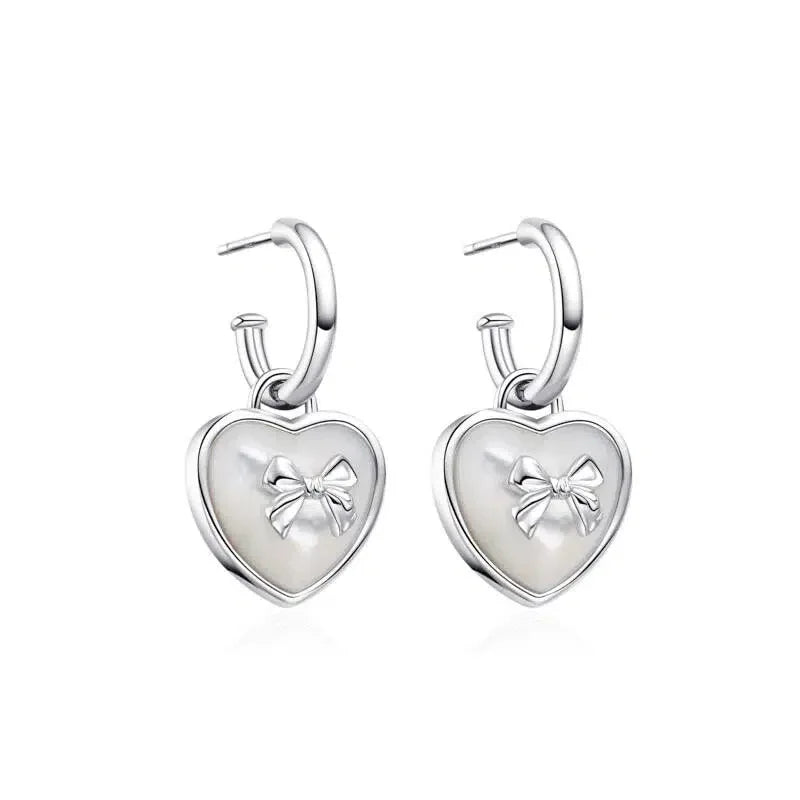 Pearl Heart Drop Earrings with Bow Detail — alternate isolated front pair