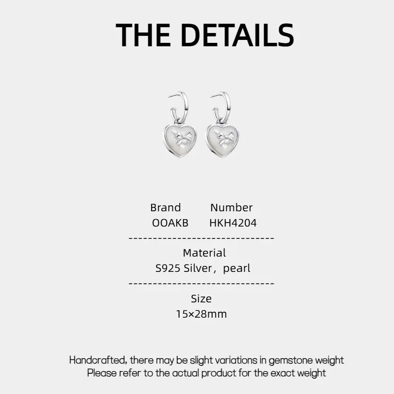 Pearl Heart Drop Earrings with Bow Detail — specification card with material and size details