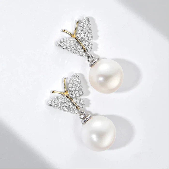 Butterfly Pearl Drop Earrings in Platinum-Plated S925 Silver — front pair on white