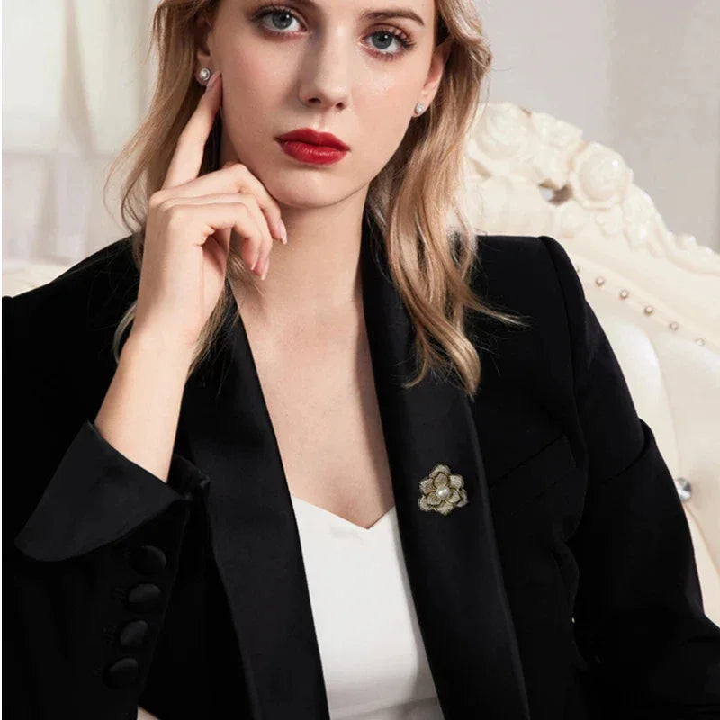 Shell Pearl Camellia Brooch — second model portrait showing the brooch scale