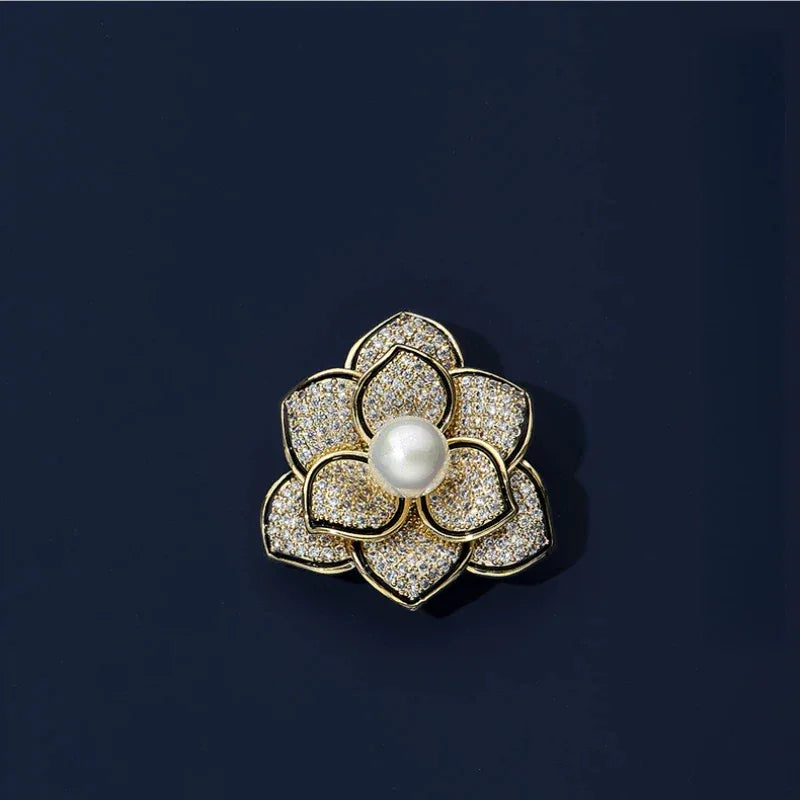 Shell Pearl Camellia Brooch — front product view on a dark background
