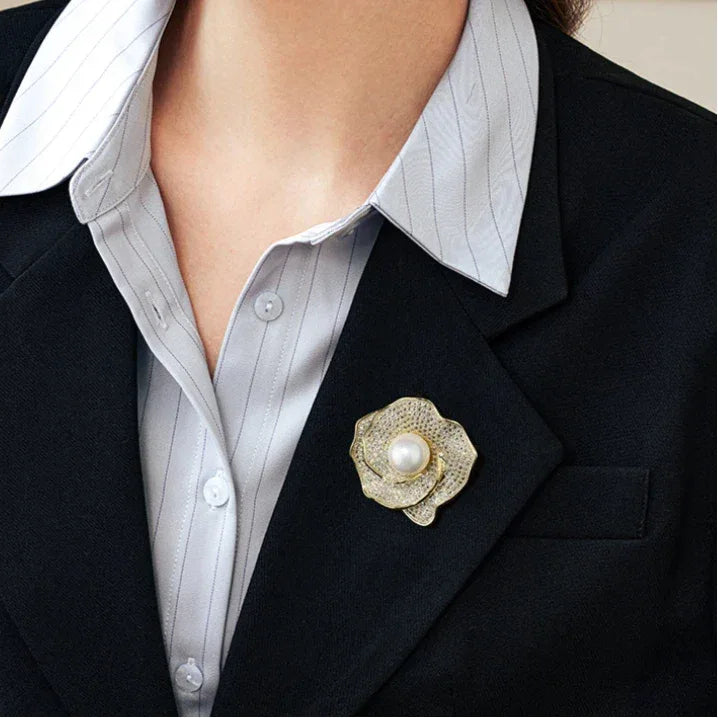 Shell Pearl Layered Camellia Brooch — close blazer-worn view showing scale