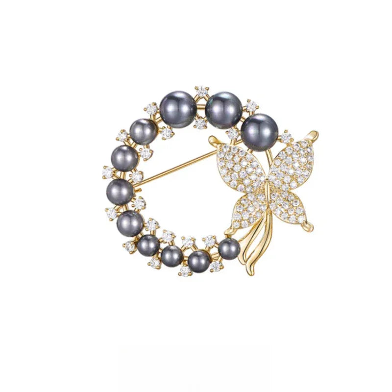 Dark Pearl Butterfly Wreath Brooch — isolated front view on a white background