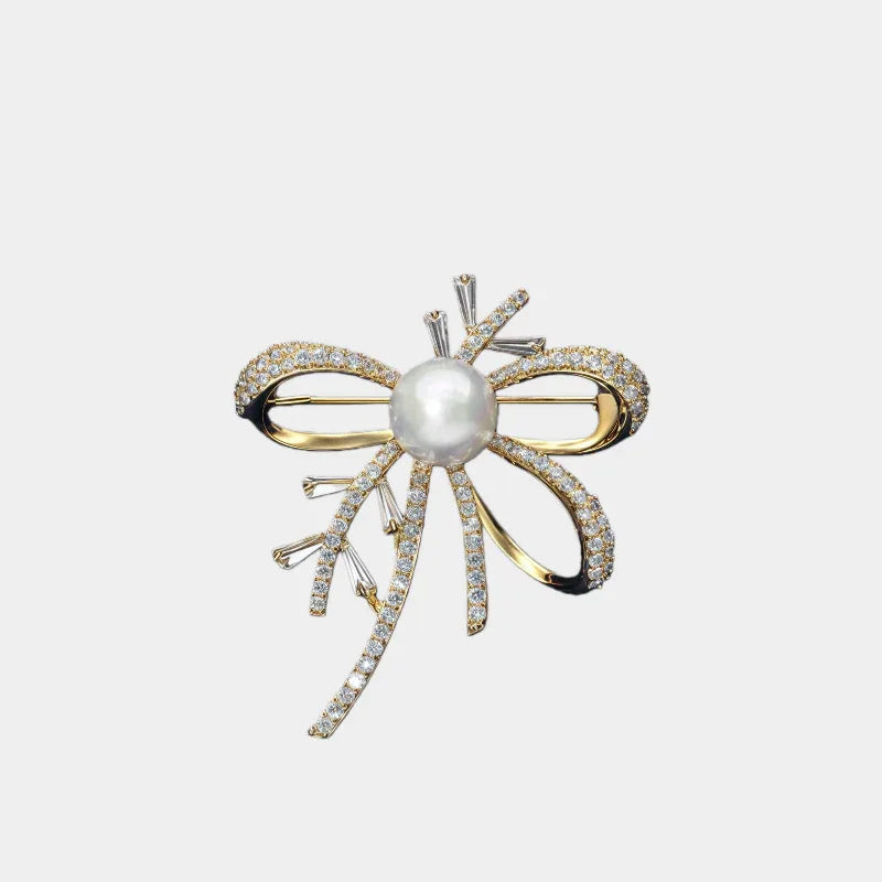 Shell Pearl Bow Brooch — front view of gold-tone bow brooch showing design and scale