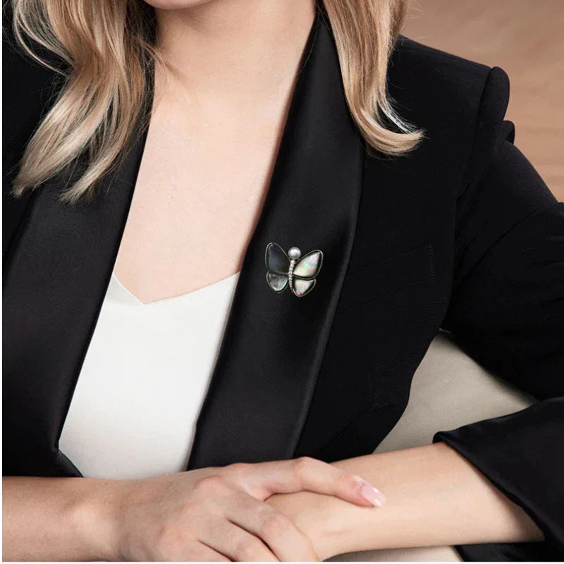 Iridescent Shell Butterfly Brooch with Shell Pearl — second blazer-worn portrait showing scale