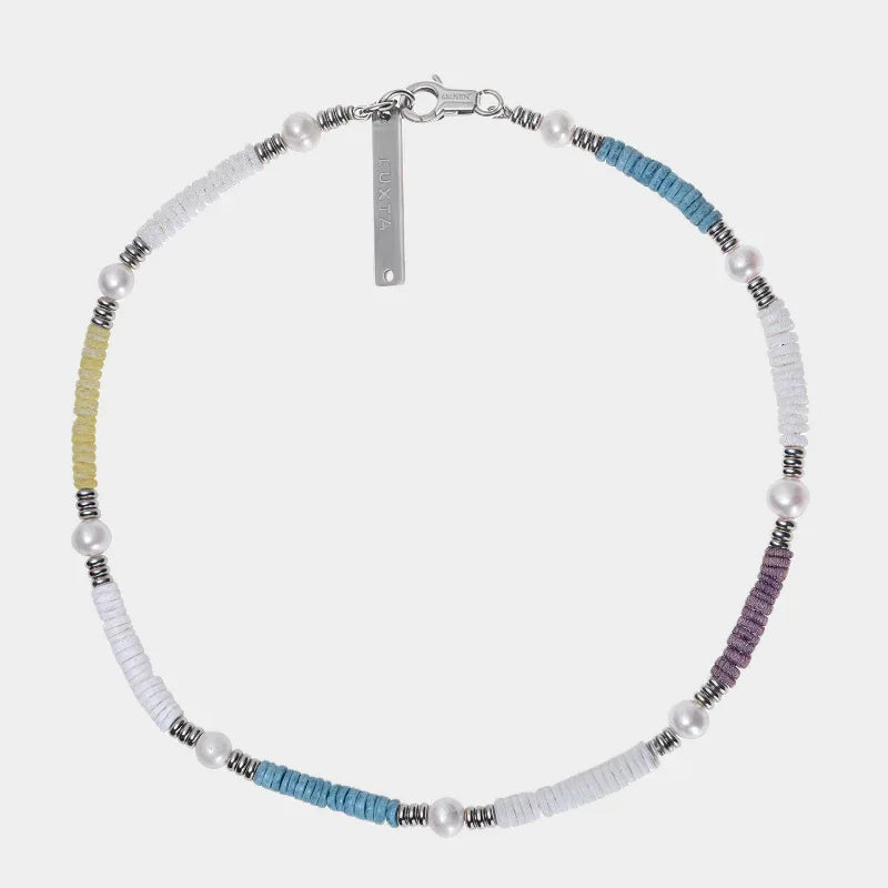 Colorful Shell Pearl Beaded Necklace — front view of necklace with short white, blue, purple and yellow bead