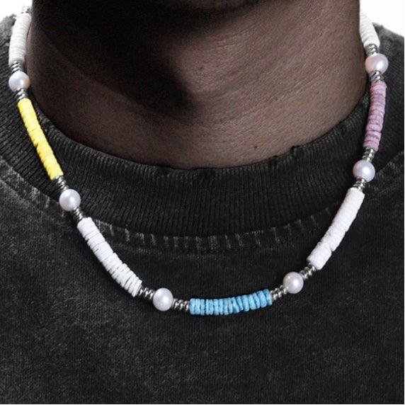 Colorful Shell Pearl Beaded Necklace — front neckline-worn close-up over a dark shirt