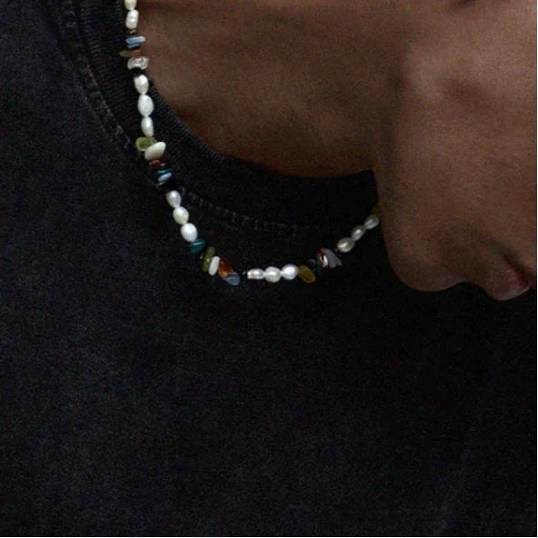 Colorful Stone Bead and Baroque Pearl Necklace — closer neckline-worn view showing the alternating pearl and stone-chip
