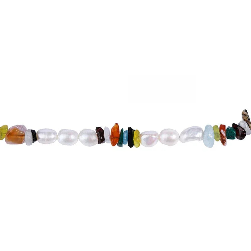 Colorful Stone Bead and Baroque Pearl Necklace — macro view of the irregular pearl surfaces and multicolor chip spacing
