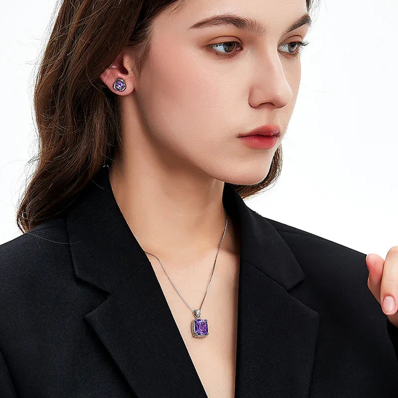 cushion-cut amethyst pendant necklace worn at the neckline in a portrait