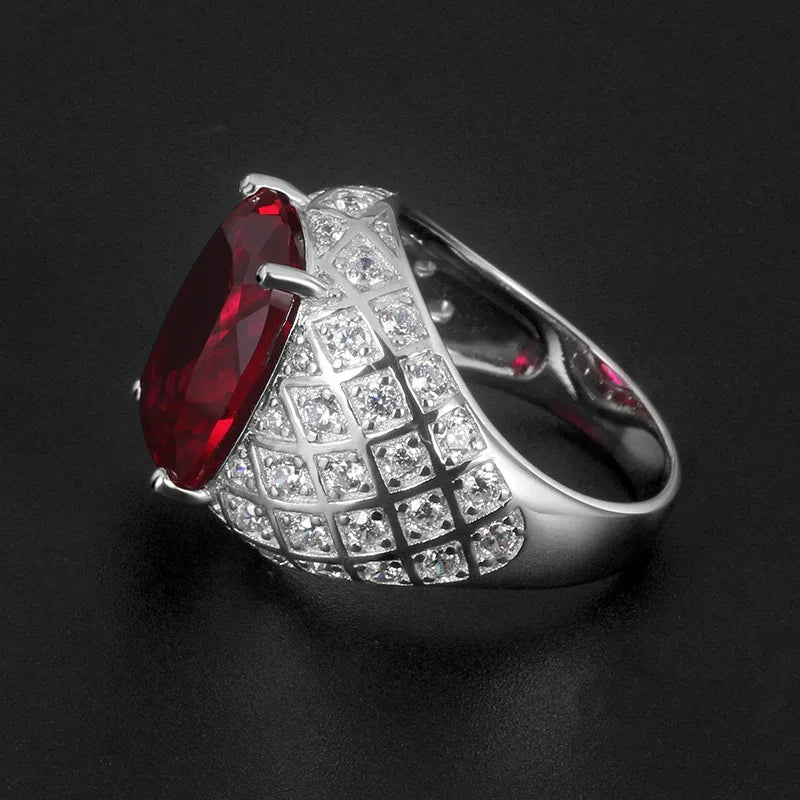 Cushion-Cut Ruby Pavé-Style Men's Ring — close-up of ruby setting