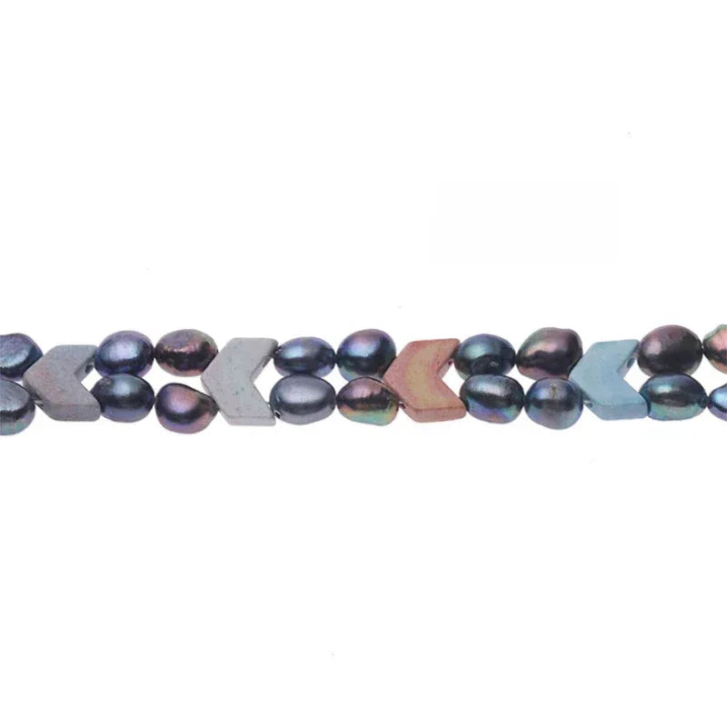 Dark Baroque Pearl Double-Strand Bracelet — macro view of the dark pearls and small pastel geometric accents
