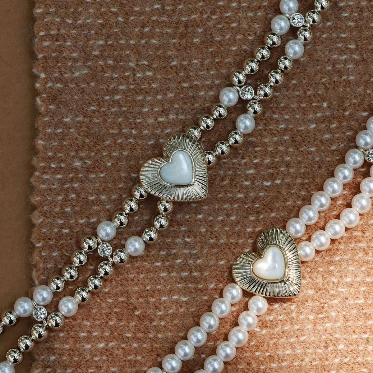 Double-Strand Pearl Heart Choker — coordinated flat lay of pearl necklaces and heart jewelry