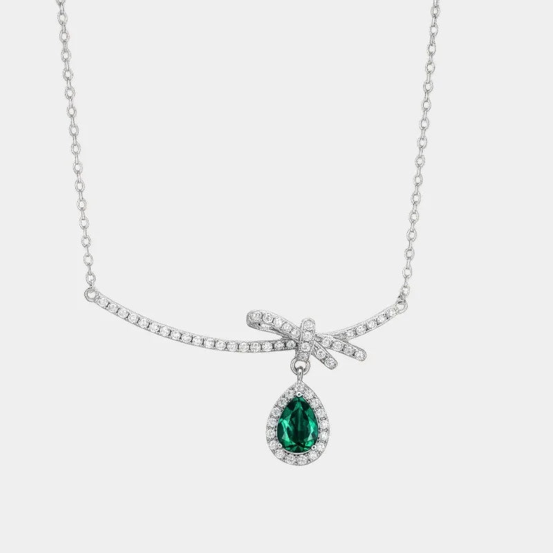 Emerald Bow and Pear Drop Necklace full necklace view on a white background