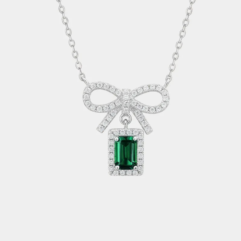 Emerald Bow Pendant Necklace full necklace view on a white background