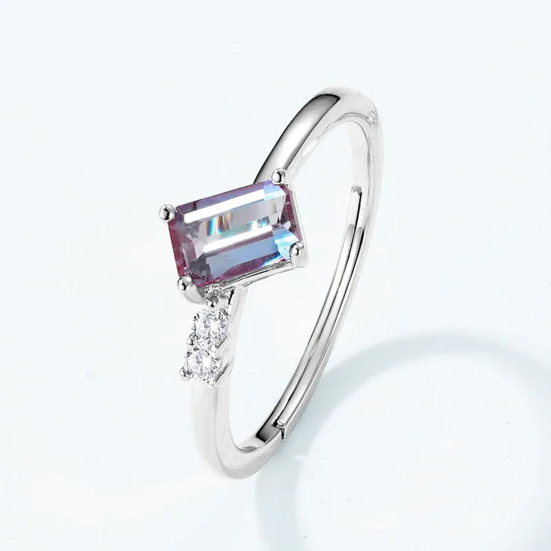 Emerald-cut Alexandrite open band ring with round clear accents, alternate additional product angle