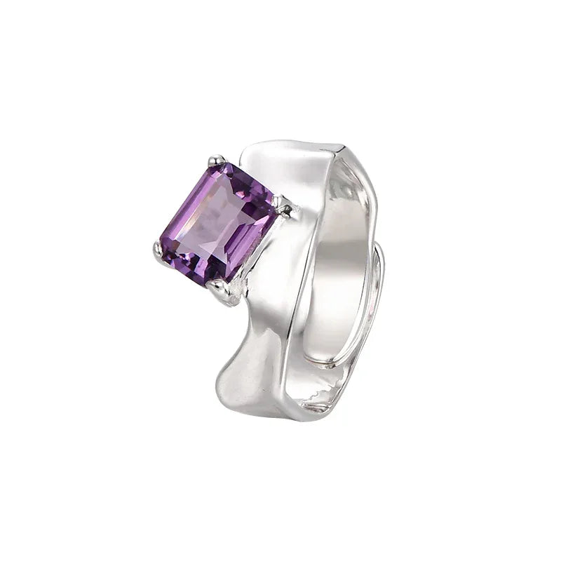emerald-cut amethyst open ring angled product view on a white background