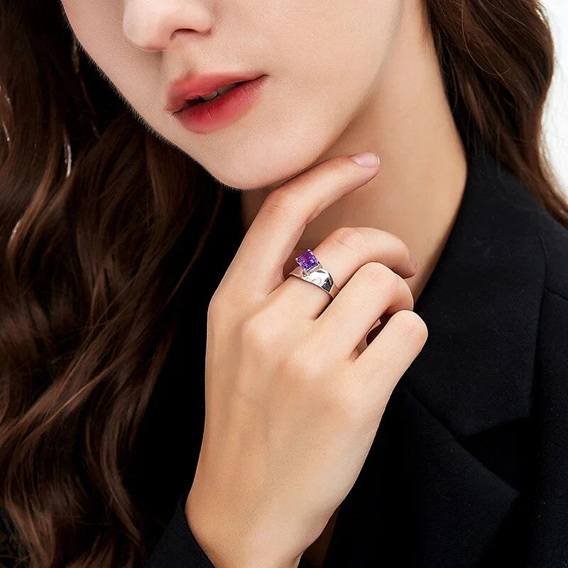 emerald-cut amethyst open ring styled portrait showing the ring for scale