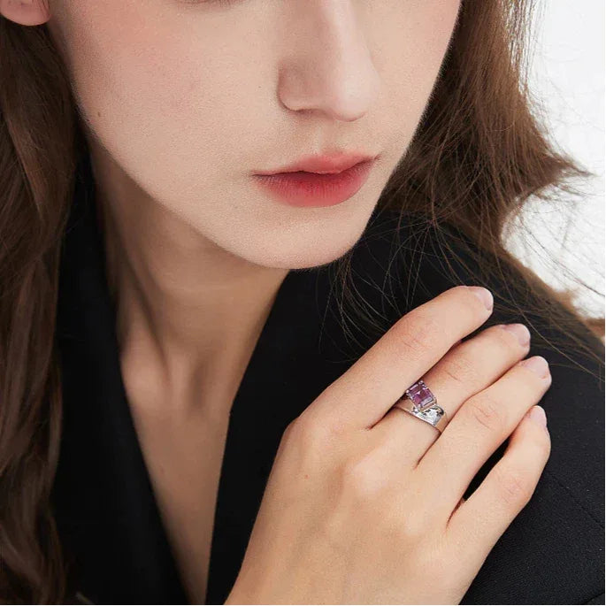 emerald-cut amethyst open ring worn on the hand from a second angle