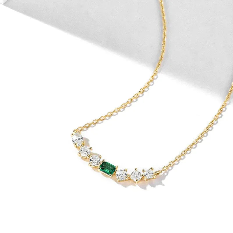Emerald Leaf Accent Necklace pendant and chain detail on white