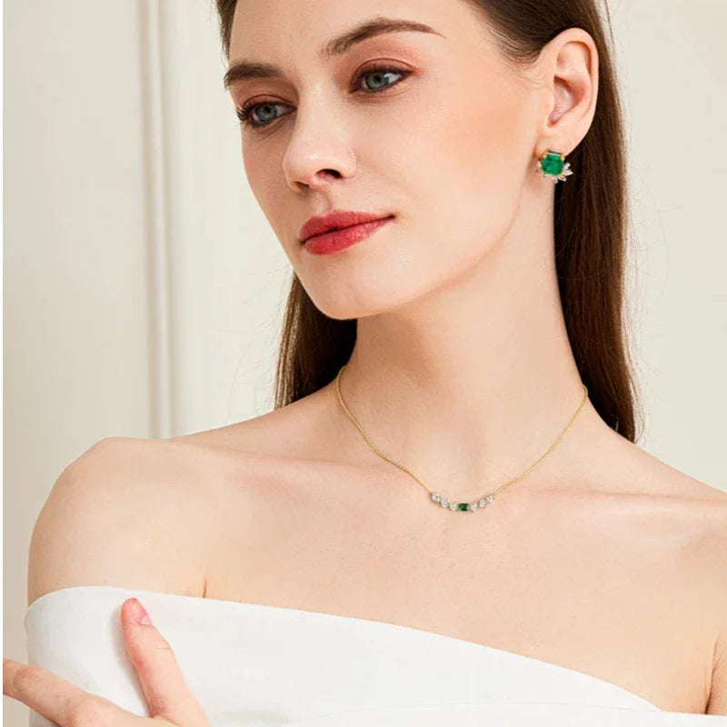 Emerald Leaf Accent Necklace worn at the neckline from a second angle