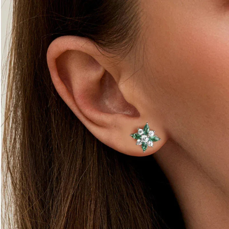 Emerald North Star Stud Earrings styled ear view showing scale