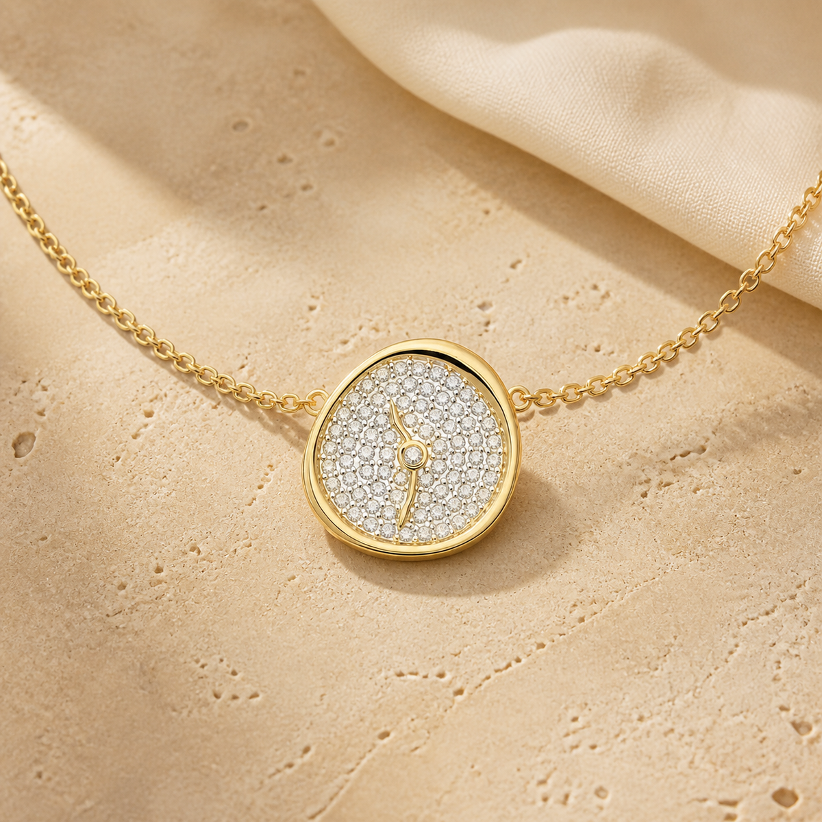 Gold flowing clock necklace with zirconia accents displayed on a warm beige tabletop