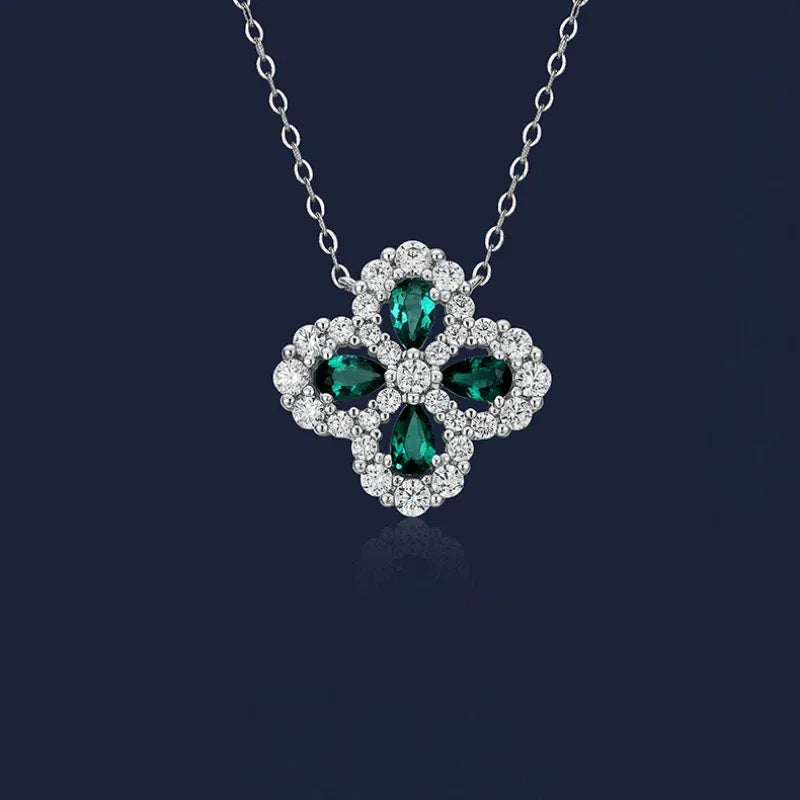 Four-Leaf Emerald Clover Pendant Necklace pendant view on a dark background