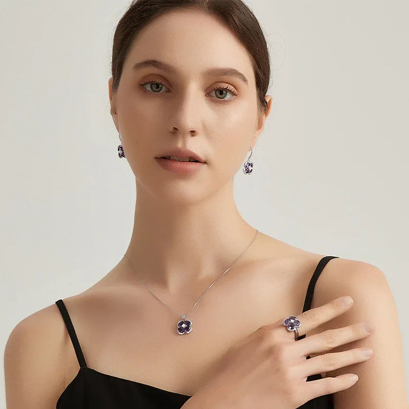 amethyst clover drop earrings side portrait with the earrings