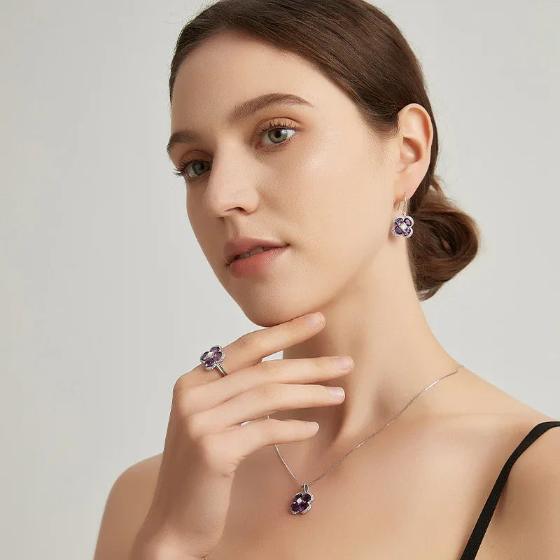 amethyst clover open ring styled portrait showing the ring for scale