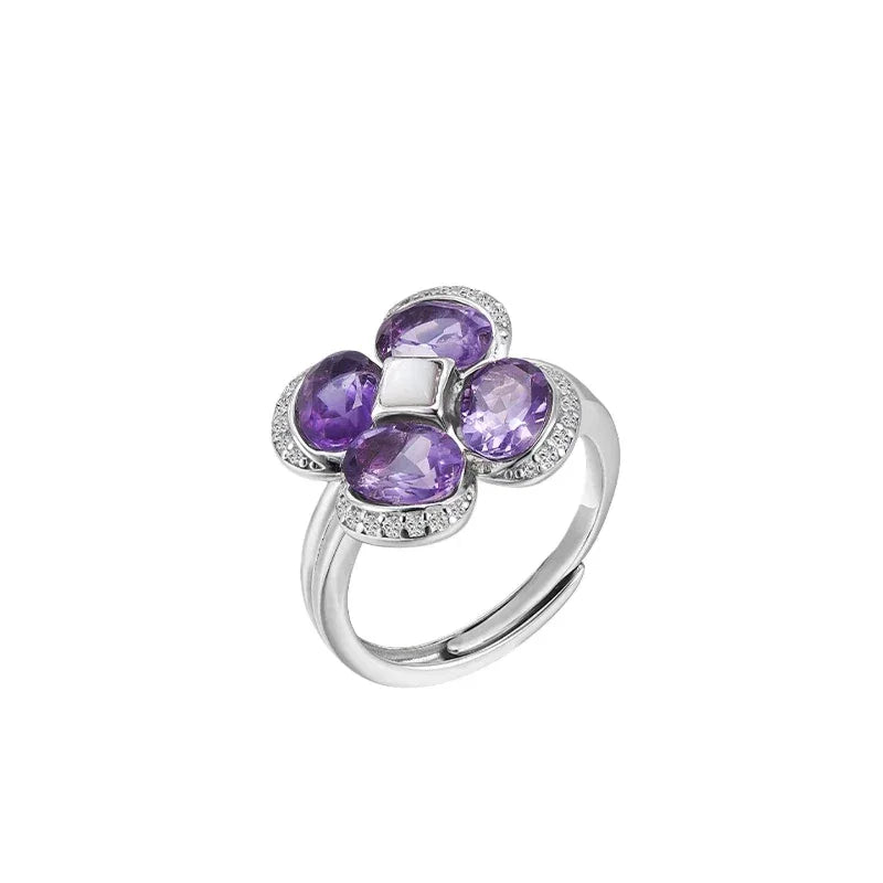 amethyst clover open ring worn detail beside the face