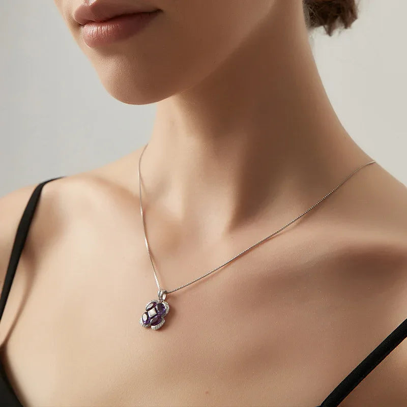 amethyst clover pendant necklace styled model view showing pendant scale
