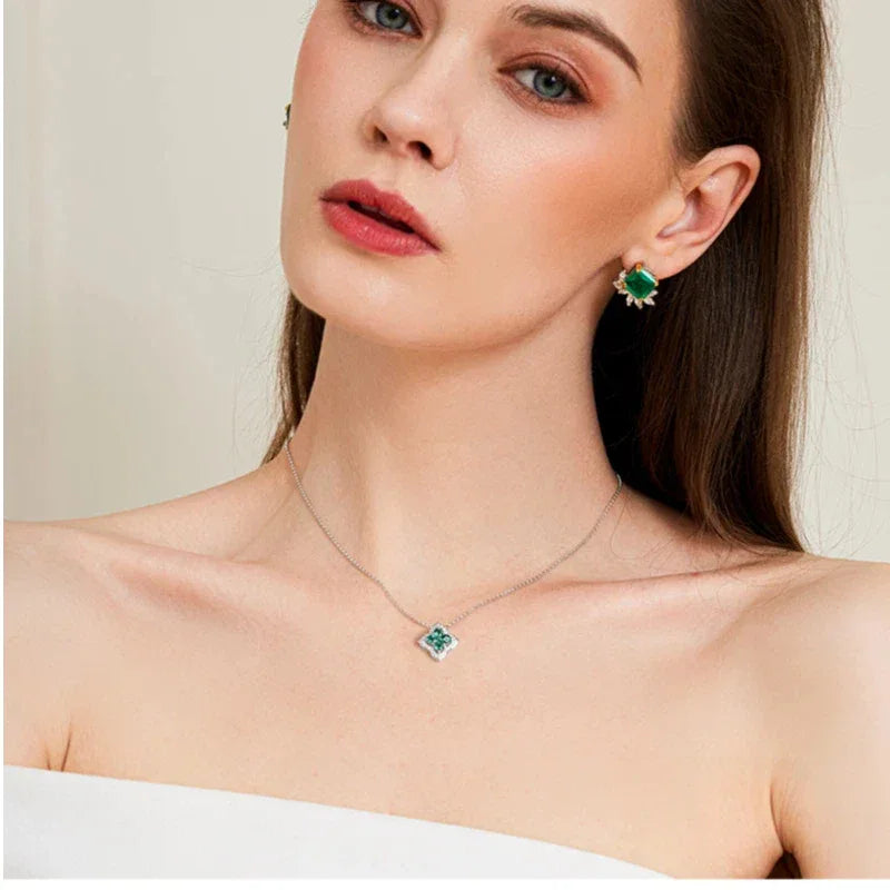 Four-Stone Emerald Floral Pendant Necklace worn at the neckline from a second angle